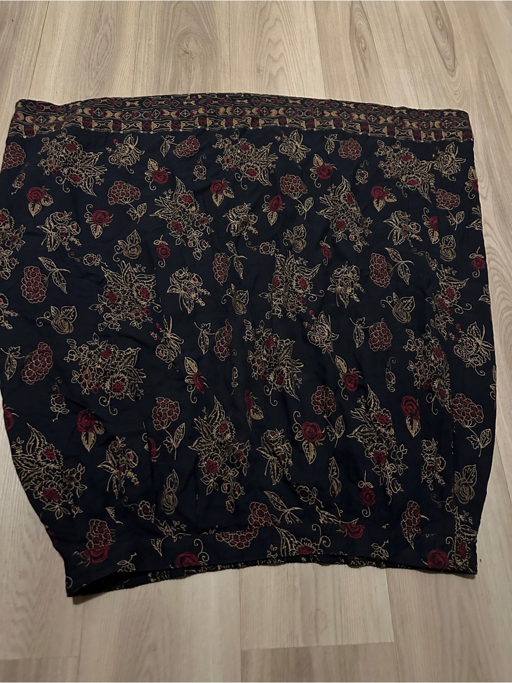 Black Floral Midi Skirt with Red and Gold Accents